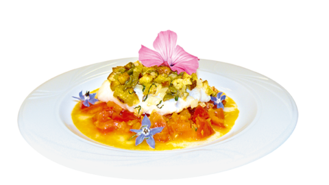 Foto von einem Fischfilet mit Fenchel-Oliven-Kruste auf Tomatenkompott